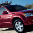 Suzuki Grand Vitara (2006-) Stereo Removal 13 Suzuki Vitara 2006 - Red with roof rack and surf board