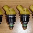 Quest to Modifying Impreza Injectors (De-Capping) 5 Subaru Impreza 550 Yellow Top Fuel Injectors