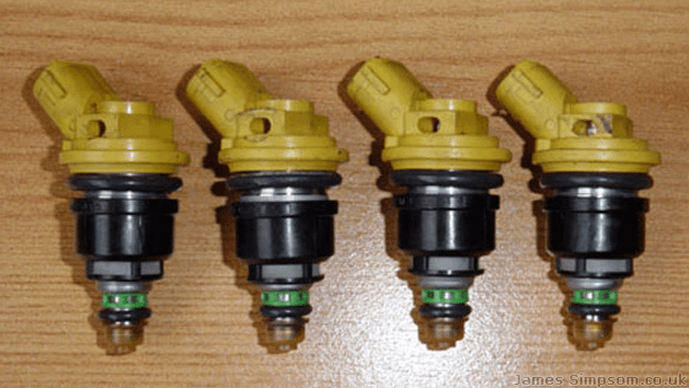 Quest to Modifying Impreza Injectors (De-Capping) 4 Subaru Impreza 550 Yellow Top Fuel Injectors